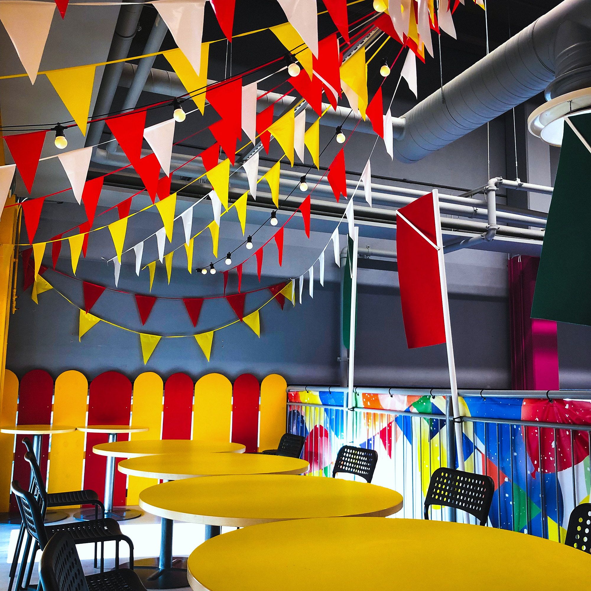 The party room with bunting and yellow tables